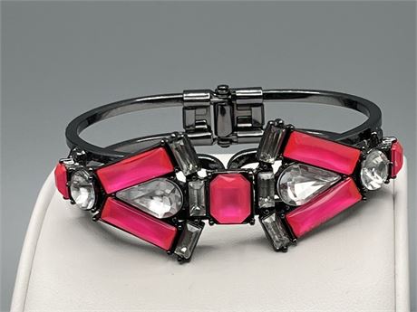 Pink plastic and rhinestone hinged bracelet