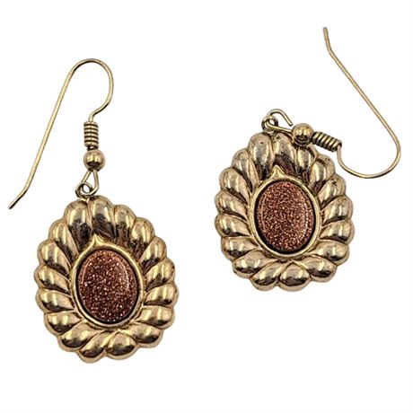 Gold Tone Oval Dangle Earrings with Goldstone Centers