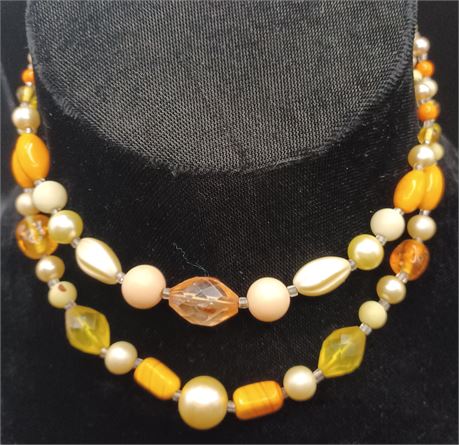 Two strand orange/cream/yellow beaded necklace