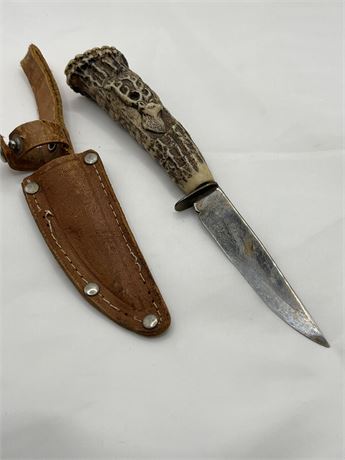 Carved deer hunting knife