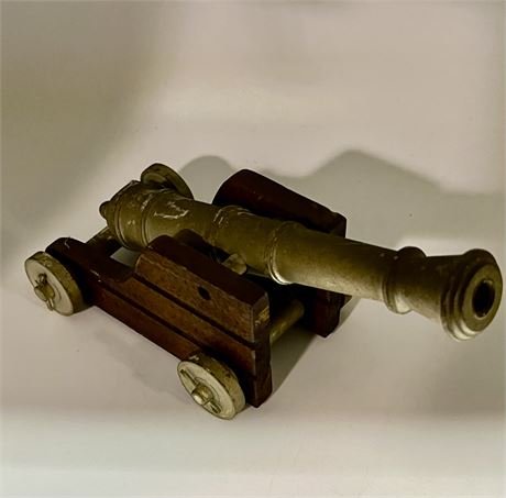 Wood and brass collectible canon