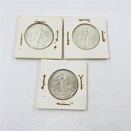 3 AU+ Walking Liberty Half Dollars