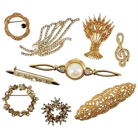Nine Vintage Gold Tone Glam Brooches, incl. Monet
