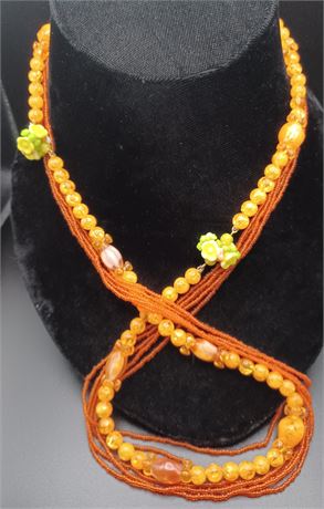 Two strand floral orange bead necklace