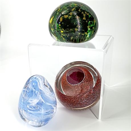 Trio of Studio Art Glass Paperweights – Green, Blue Swirl & Red Core Designs