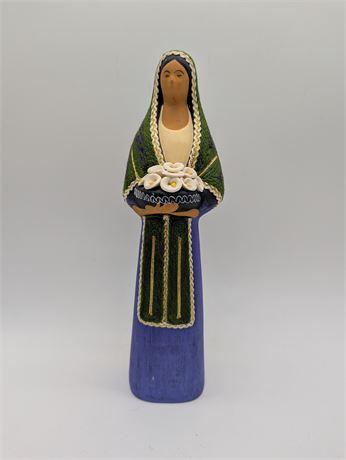 Signed Mexican woman pottery figurine w/Calla Lillies