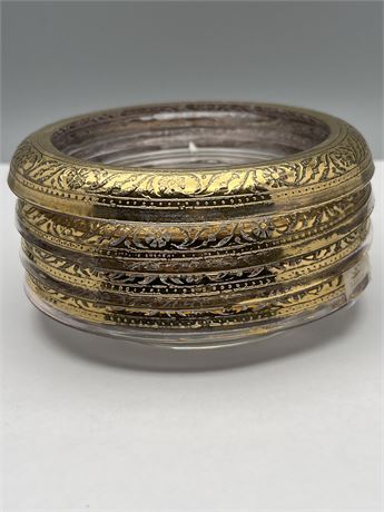 Set a four vintage gold rim coaster set
