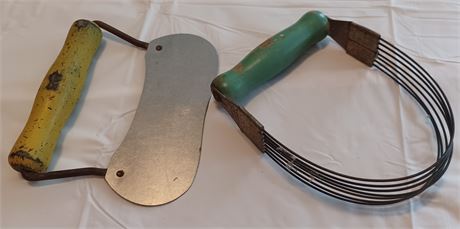 Vintage kitchen utensils dough cutter and a slicer