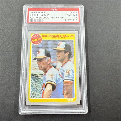 PSA 8 - 1985 Fleer Ripken + Son