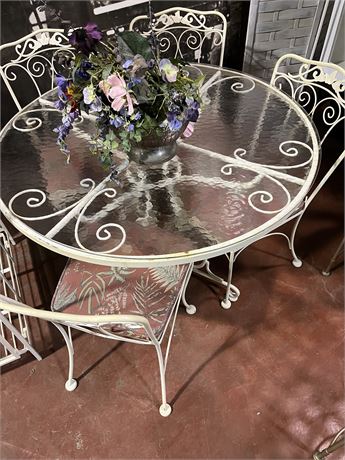 Wrought iron vintage garden table and chairs