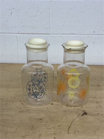 Two (2) Pyrex Juice Pitchers