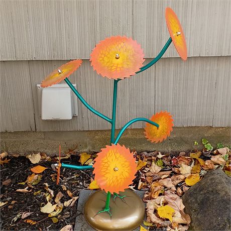 Metal Flower Yard Art and Potted Plant