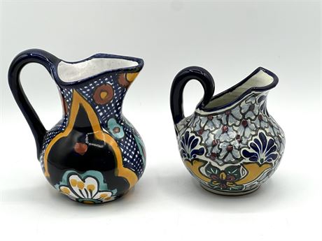 Two Small Ceramic Pitchers