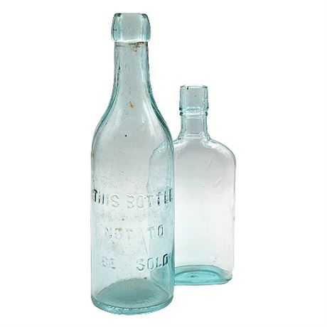 Pair Vintage Aqua Glass Bottles