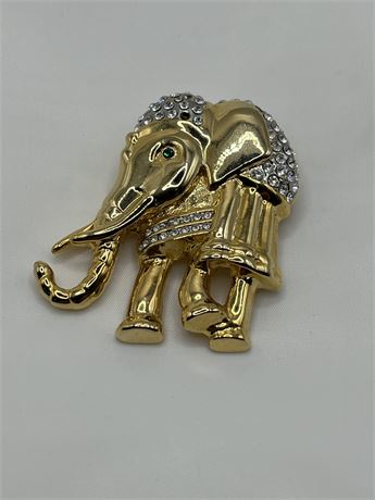 Sworoski  crystals, polished gold tone brooch