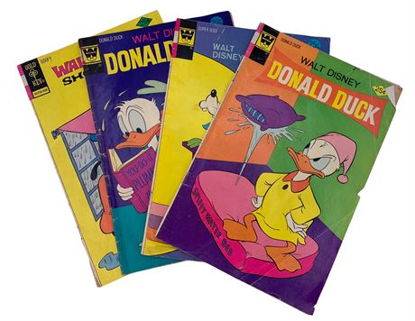 Four 20 cent & 25 cent Disney Donald Duck & Goofy Comic Books
