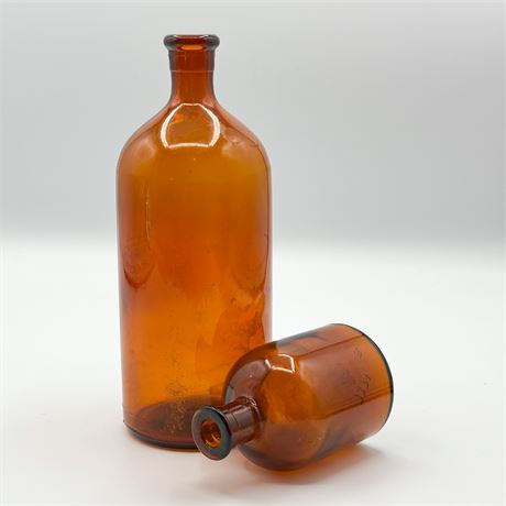 Pair of Antique Amber Bottles