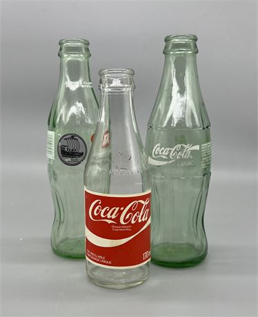 3 Commemorative Coca Cola Bottles