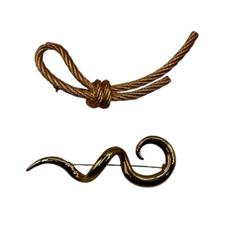 Two Gold Tone Pins