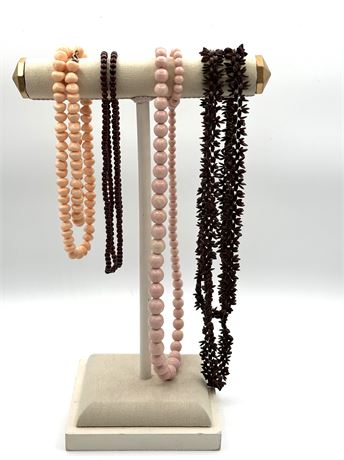 4 Necklaces, brown, pink and peach colors