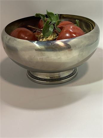 Pedestal stainless steel bowl and plastic apples