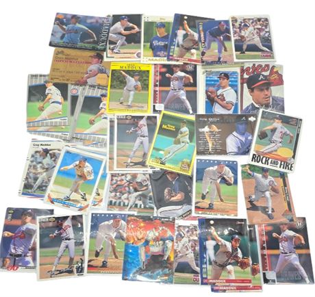 Huge Lot of Greg Maddux Baseball Cards
