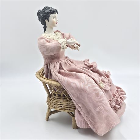 Special Place Porcelain Doll with Wicker Bench