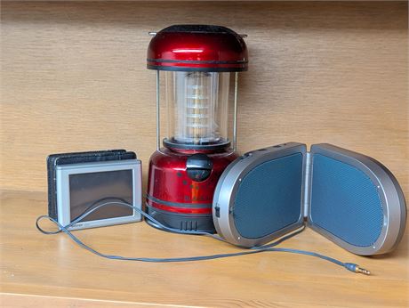 Lot Garmin Navigation System, RCA Speakers and Battery Operated Camp Light