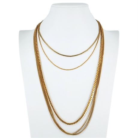 Four Vintage Gold Tone Necklaces, Incl. SARAH COVENTRY and MONET