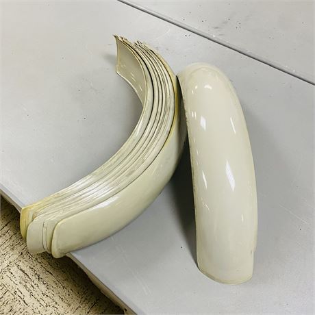 11 NOS Plastic Fenders