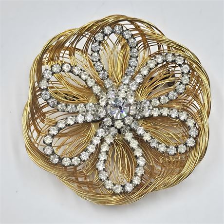 Gold toned wired rhinestone flowered brooch 2  inches