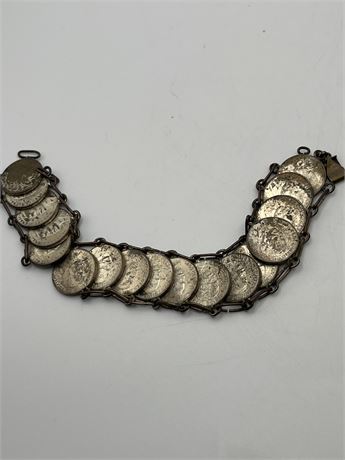 World War II trench art coin bracelet