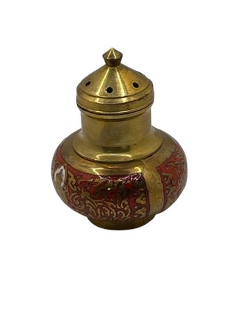 Vintage bra and enamel salt shaker