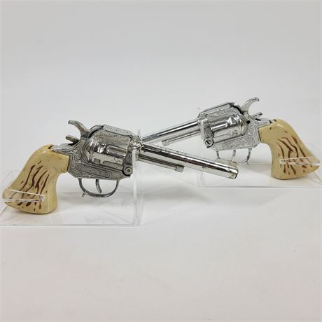Pair of Revolver Cap Guns Chrome with Ivory Grips / Holster