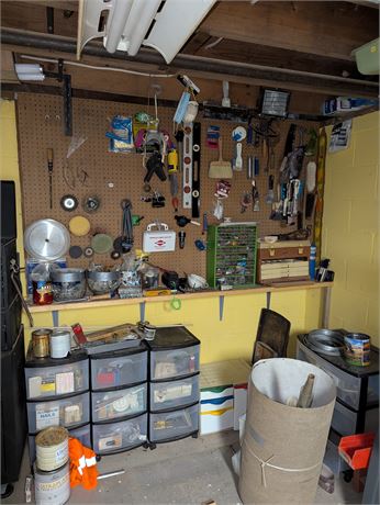 Lot wall of tools and bins of tools