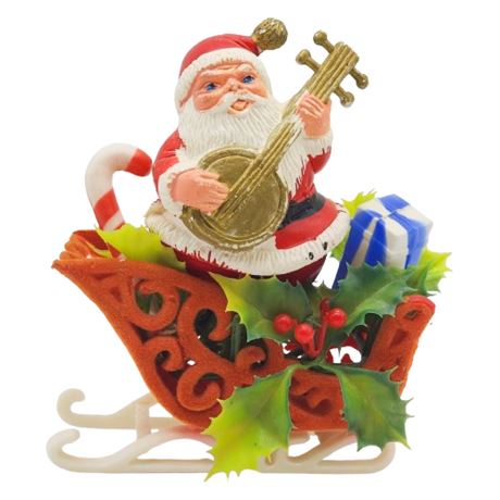 Vintage Soft Plastic Santa in Flocked Sleigh w/ Banjo & Holly