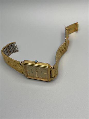 Vintage Olay Cassini quartz watch