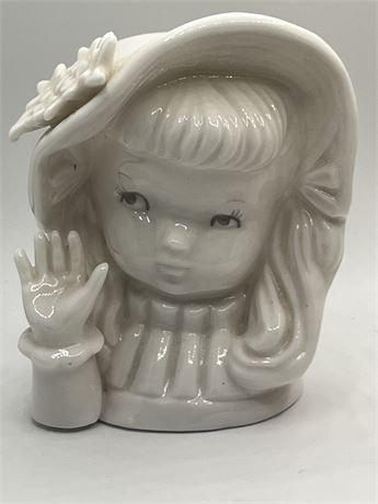 White glazed baby headvase