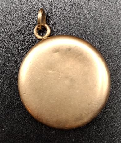 D&C gold filled round locket with a few dents 7.2 G