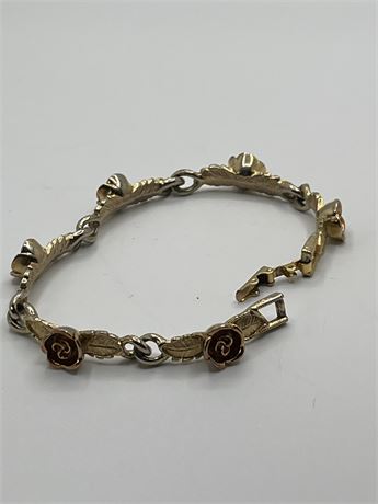 Avon gold tong and rosegold, leaf roses bracelet
