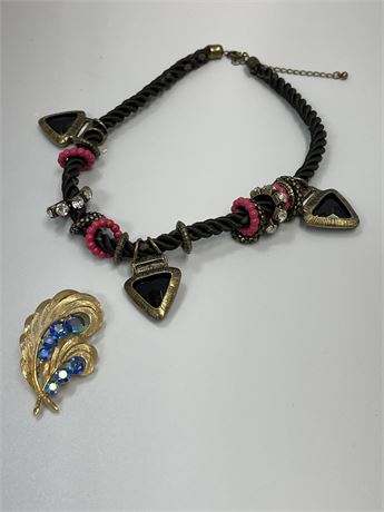 Lisner , feather blue and pink brooch and a black heart rope necklace lot