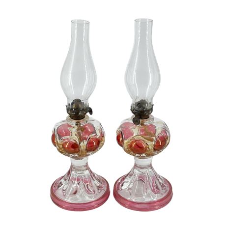 Pair of Cranberry Bullseye Art Glass Oil Lamps