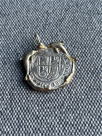 Atocha silver with dolphins coin