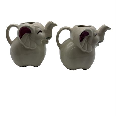 Two (2) Shawnee Pottery Elephant Creamers