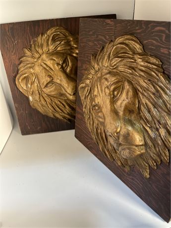 2 lionhead head plaques