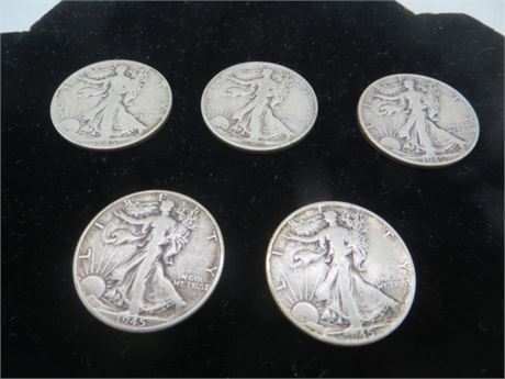 Five 1945 Walking Liberty Half Silver Dollars