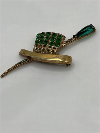 Vintage green rhinestone  goldtone hat, and feather brooch