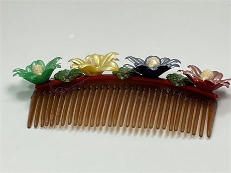 Hawaiian style flowered celluloid vintage comb