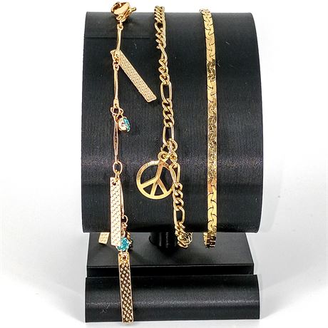 Lot of 3 Gold-Tone Bracelets – Mixed Styles – Peace Sign, Textured Bars, Figaro