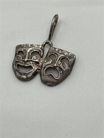 Vintage silver theater faces charm